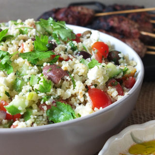 Close up image of mediterranean couscous salad.